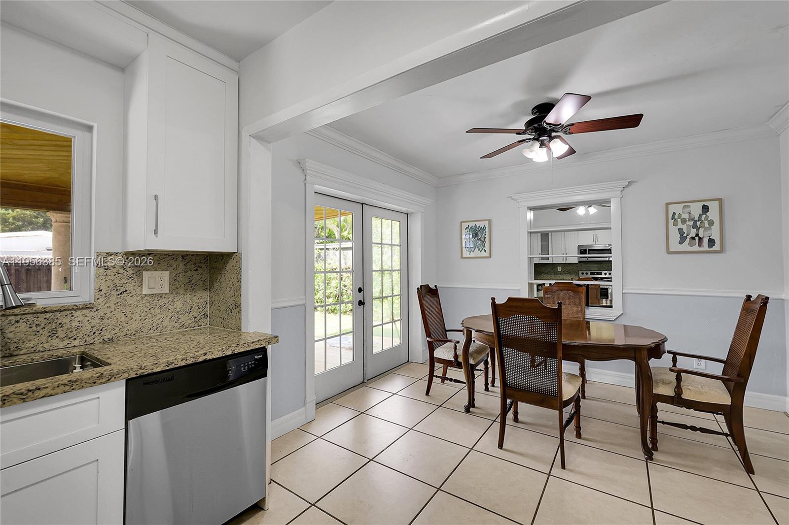 3614 Southwest 58th Avenue Miami, FL 33155 - Photo 20 of 27 a view of a dining room with furniture and a window