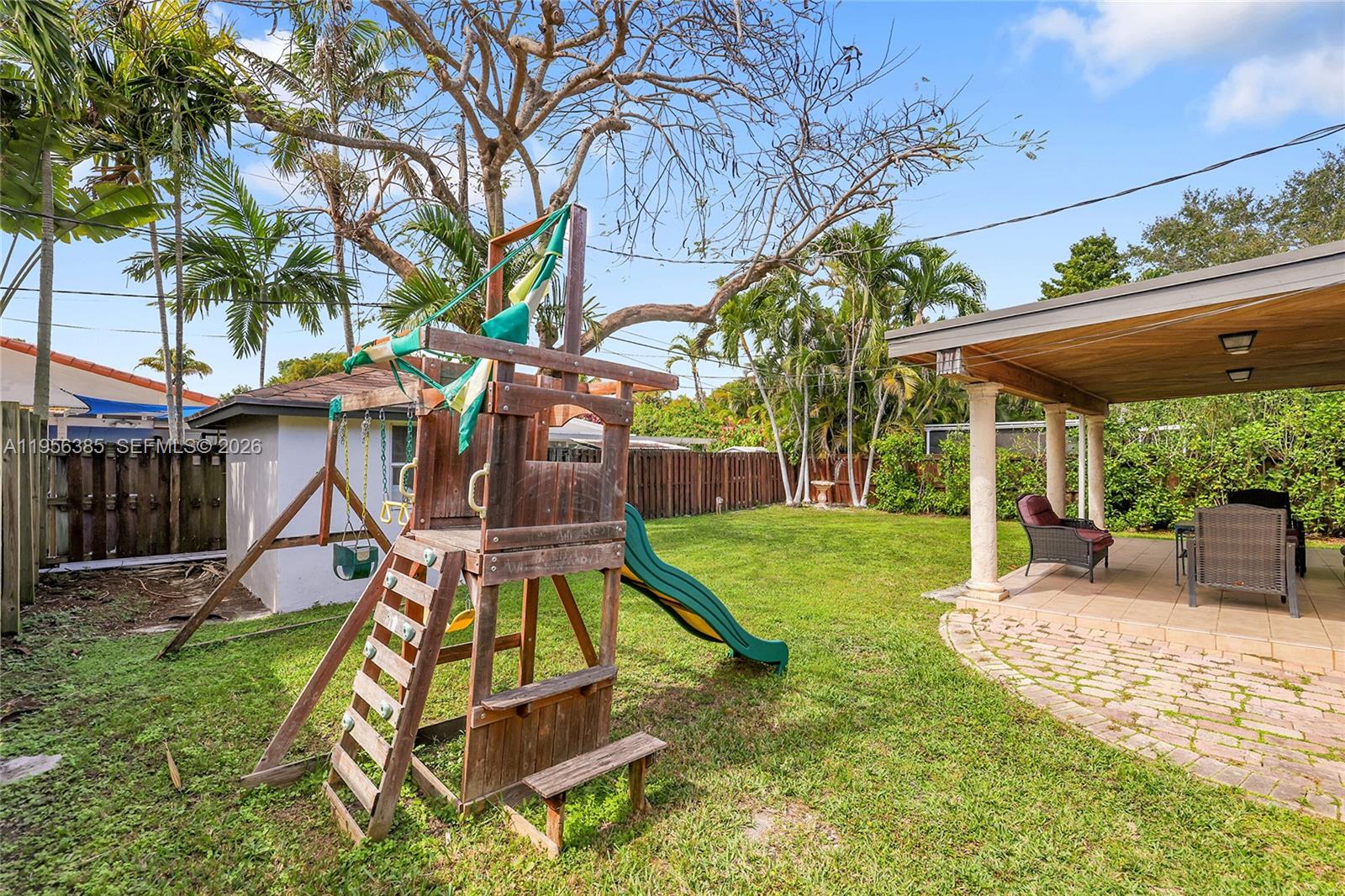 3614 Southwest 58th Avenue Miami, FL 33155 - Photo 27 of 27 a view of a backyard with a patio