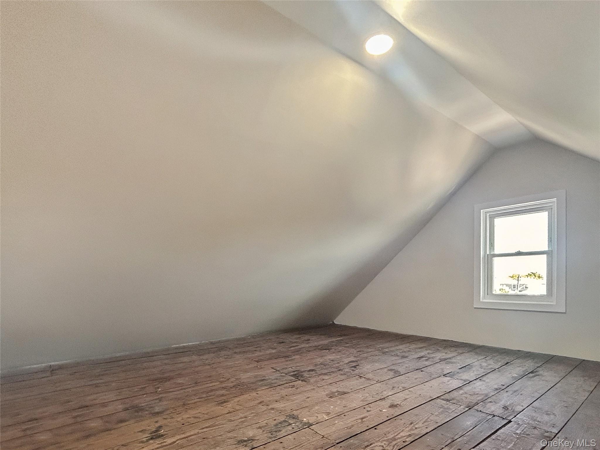 20 West 18th Road Queens, NY 11693 - Photo 35 of 41 a view of an empty room and window