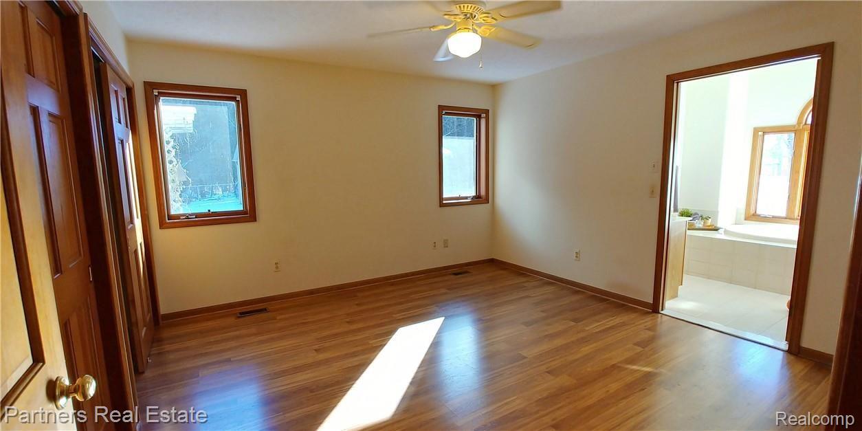 1701 West Cohoctah Road Howell, MI 48855 - Photo 27 of 50 N. Main Floor Master Bedroom