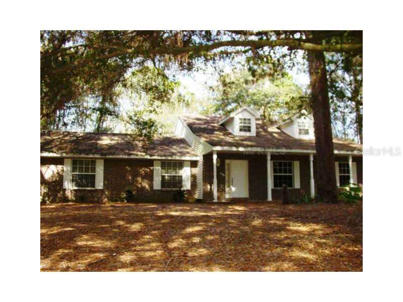a view of a house with a ocean view
