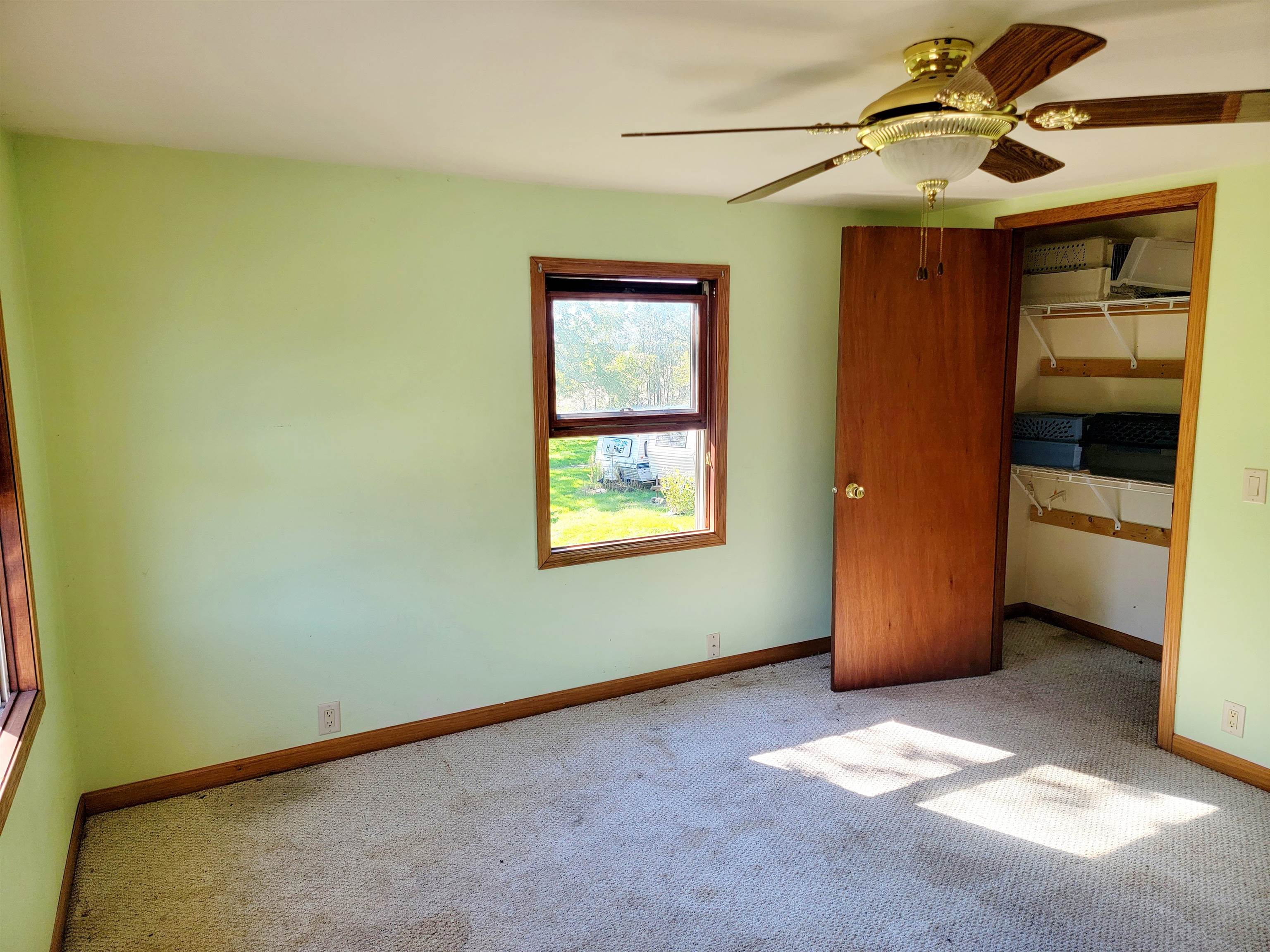 8014 South Creek Road Beloit, WI 53511 - Photo 32 of 39 a view of an empty room with a window