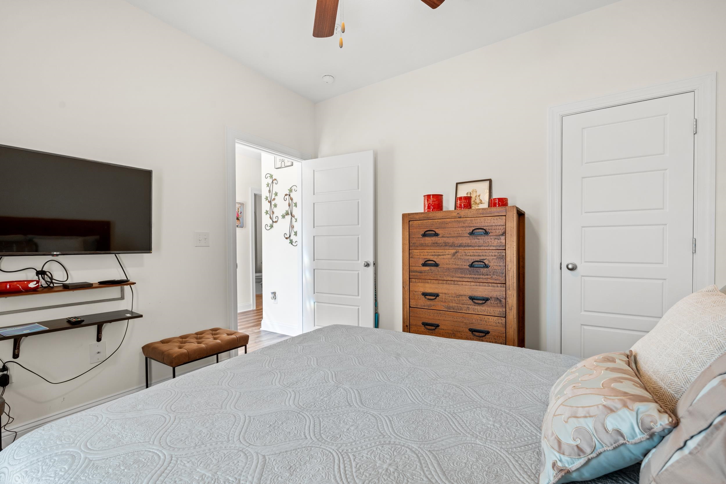 900 Jackline Place, Unit 202 Murrells Inlet, SC 29576 - Photo 29 of 39 Bedroom featuring a ceiling fan and a closet