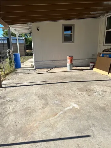 a view of a livingroom with wooden floor
