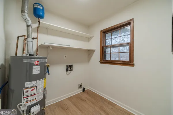 a view of storage and utility room with empty racks