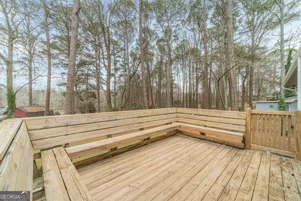 a view of backyard and deck