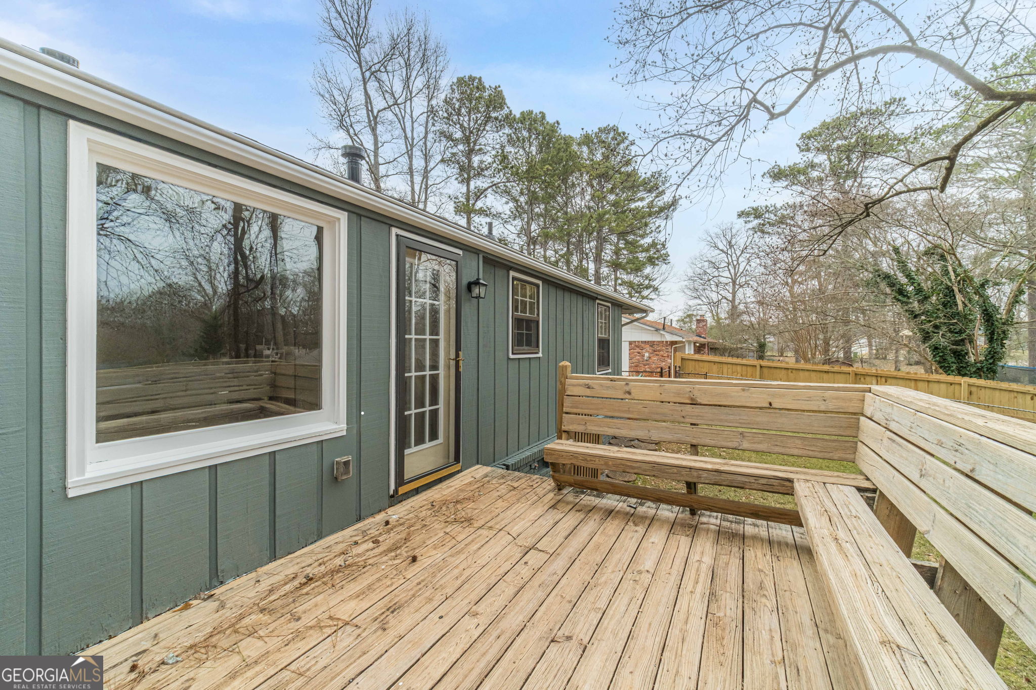 1678 Pounds Road Southwest Stone Mountain, GA 30087 - Photo 25 of 30 a view of a house with a large window