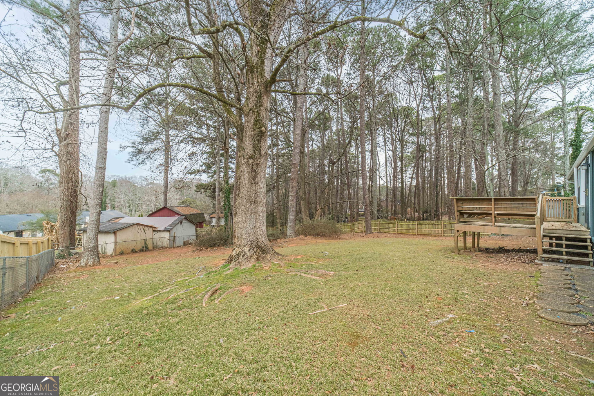 1678 Pounds Road Southwest Stone Mountain, GA 30087 - Photo 26 of 30 a view of yard with swimming pool and sitting area