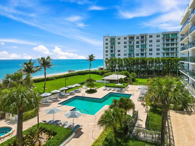 a view of a lake with a building in front of it