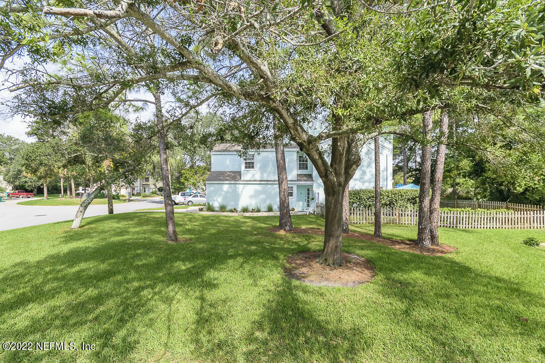 127 Sand Castle Way Neptune Beach, FL 32266 - Photo 3 of 36 a view of a park with a tree
