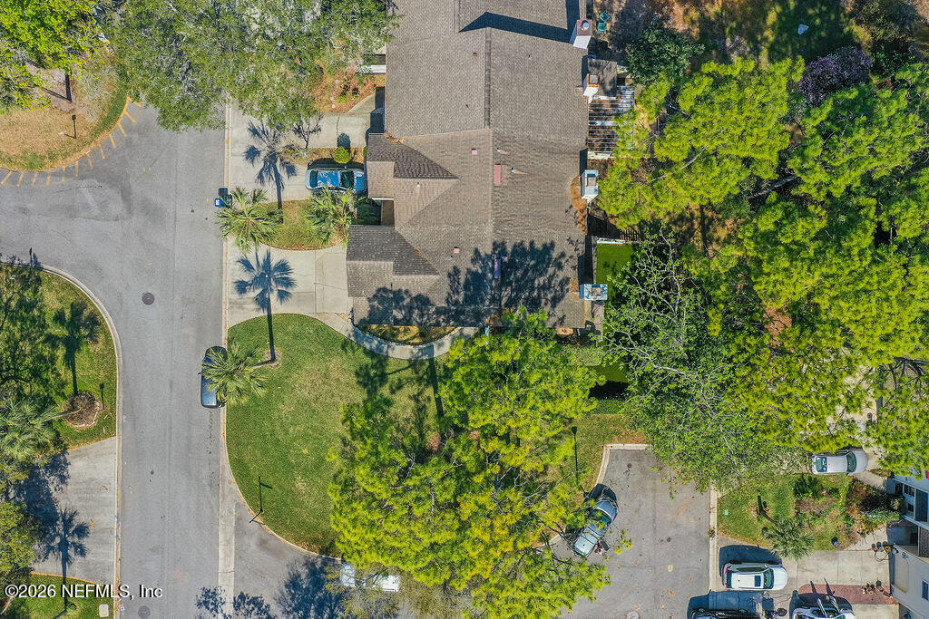 127 Sand Castle Way Neptune Beach, FL 32266 - Photo 33 of 36 an aerial view of a residential house with outdoor space and trees all around