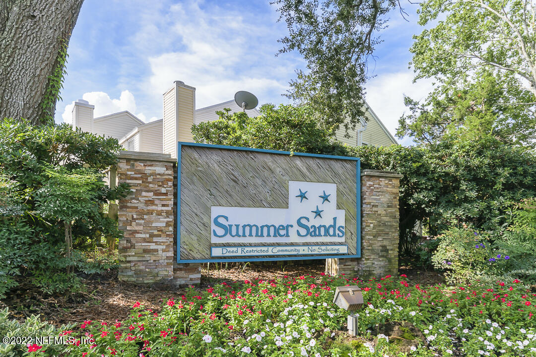 127 Sand Castle Way Neptune Beach, FL 32266 - Photo 36 of 36 a sign on the side of a building