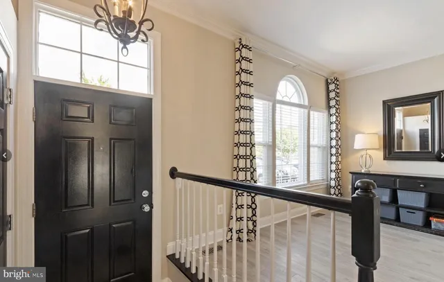 a view of an entryway with a front door