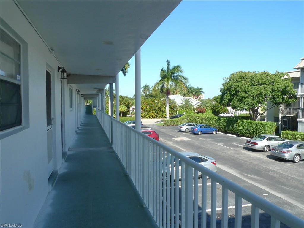 72 7th Street South, Unit 203 Naples, FL 34102 - Photo 3 of 23 a view of a street from a balcony