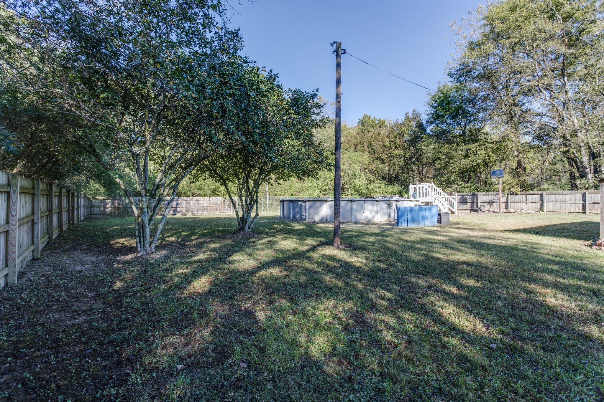 1008 South Spring Street Manchester, TN 37355 - Photo 57 of 60 The generous size of the yard also provides the perfect canvas for weekend BBQs, family gatherings, or even future landscaping projects.