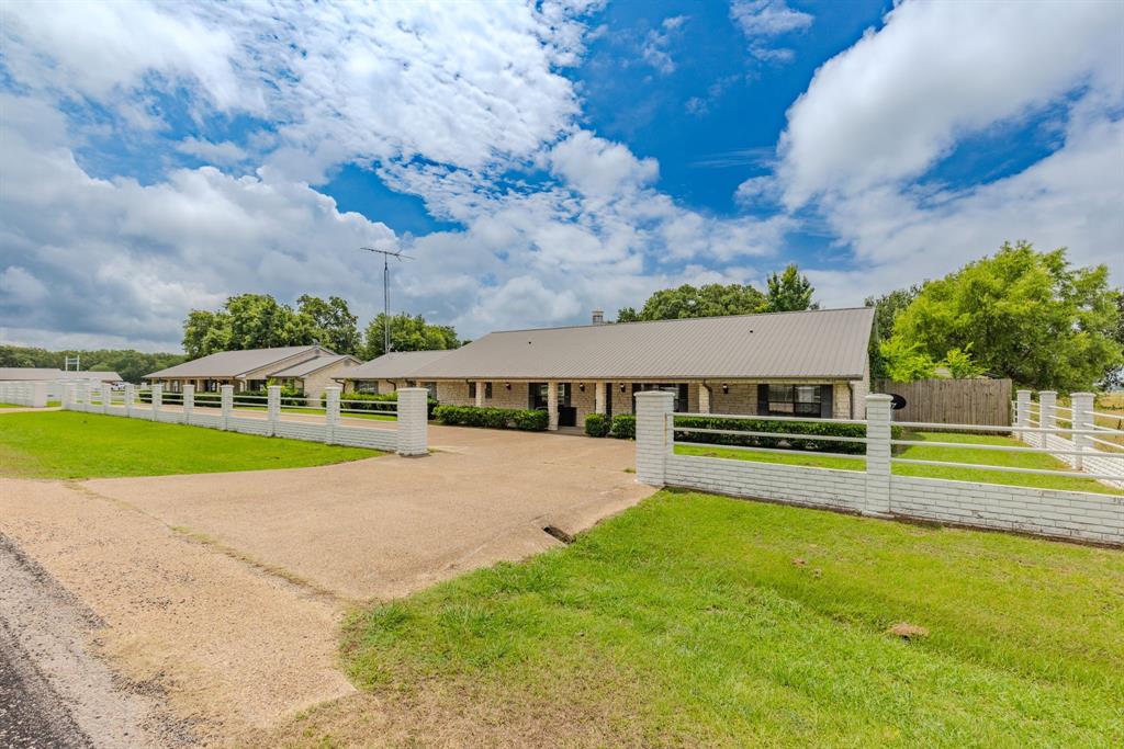 4509 Diamond D Road Lone Oak, TX 75453 - Photo 21 of 36 a view of house with swimming pool and yard