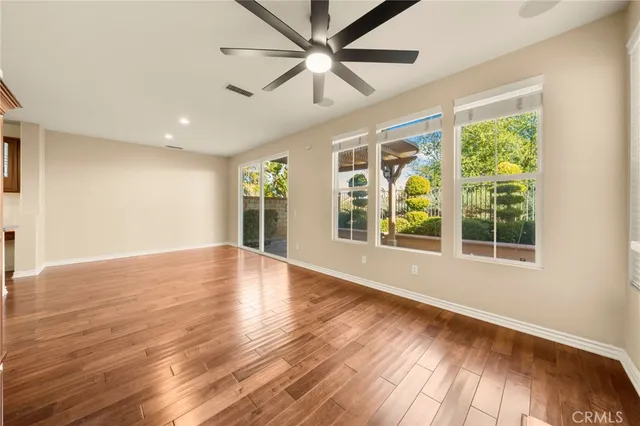 a large kitchen with granite countertop a sink and dishwasher stove top oven