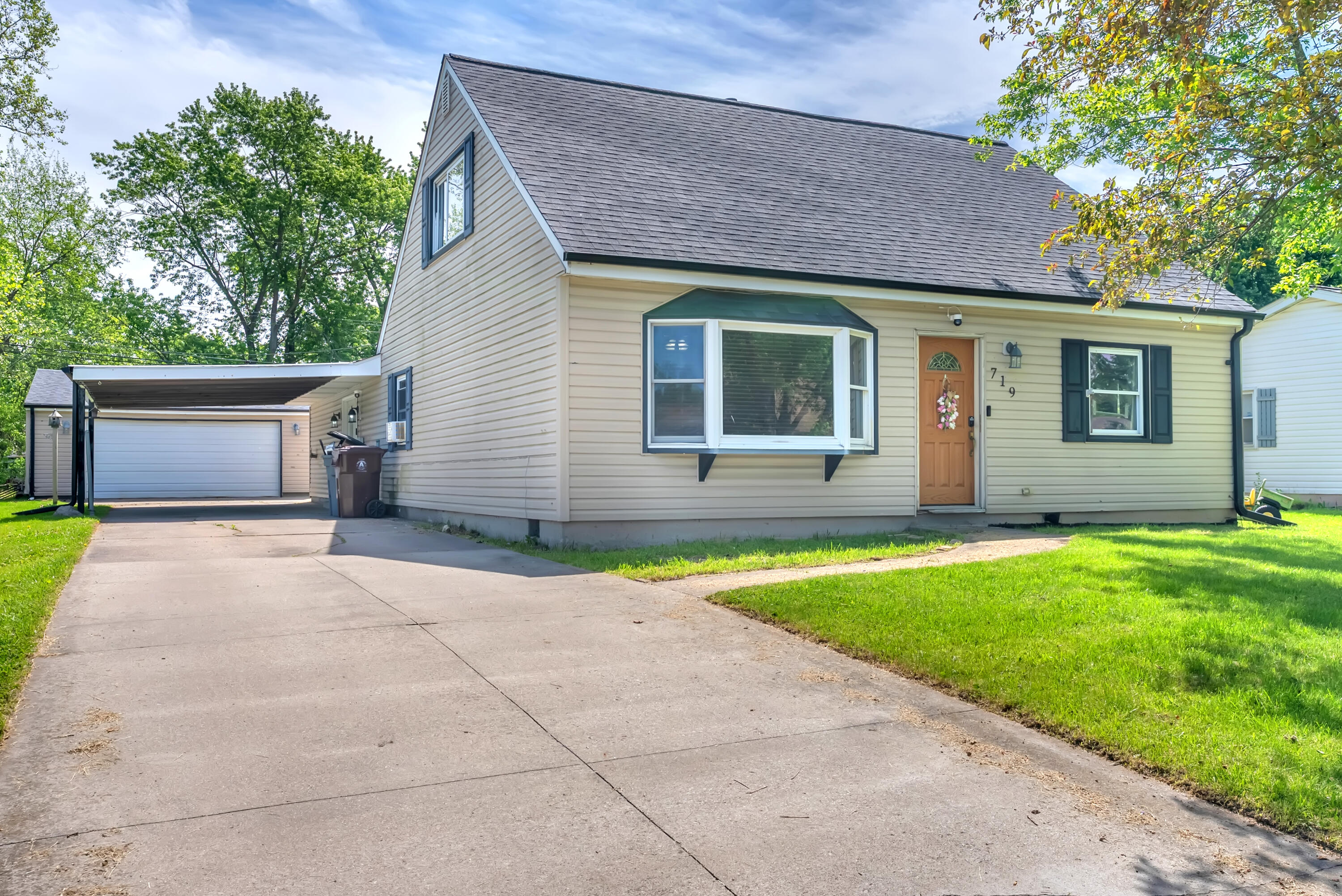 719 Capitol Road Valparaiso, IN 46385 - Photo 1 of 37 a view of a house with a yard and a large tree