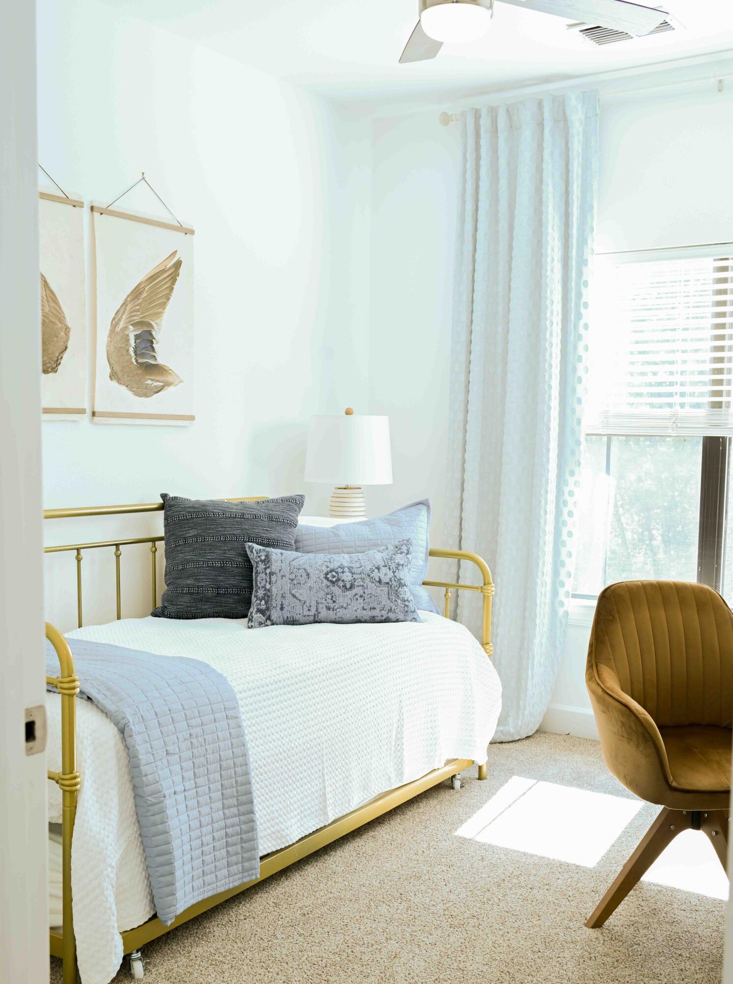 90 Southaven Circle Santa Rosa Beach, FL 32459 - Photo 20 of 29 a bedroom with a bed and a chair