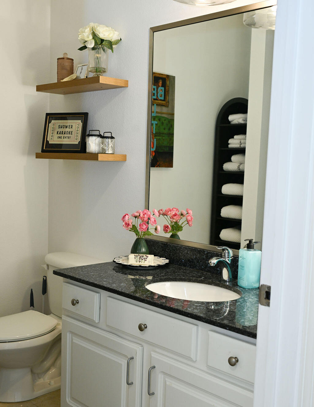90 Southaven Circle Santa Rosa Beach, FL 32459 - Photo 25 of 29 a bathroom with a granite countertop sink a toilet and vanity
