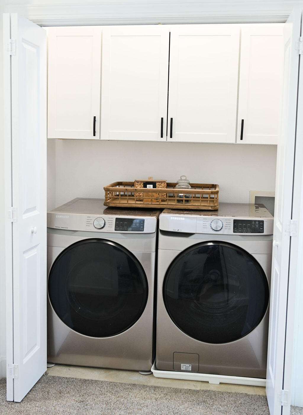 90 Southaven Circle Santa Rosa Beach, FL 32459 - Photo 26 of 29 a close up view of a washer and dryer