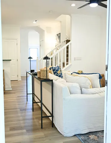 a living room with furniture and a table