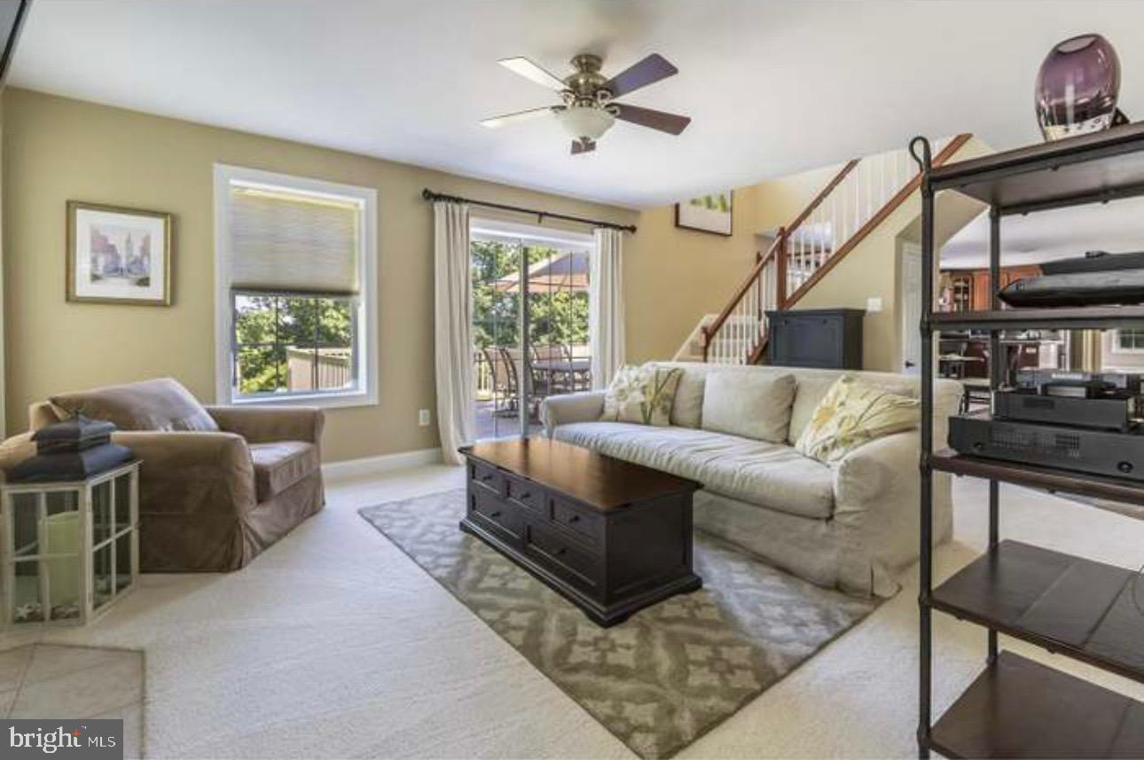29 South Elmwood Road Marlton, NJ 08053 - Photo 4 of 24 a living room with furniture ceiling fan and a window