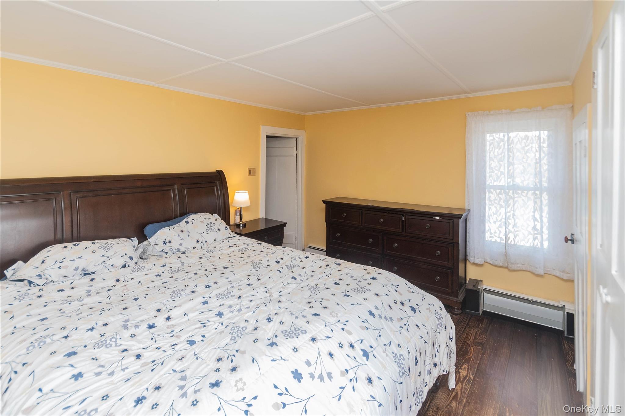 269 Orchard Road Highland, NY 12528 - Photo 14 of 24 a bedroom with a bed and a dresser