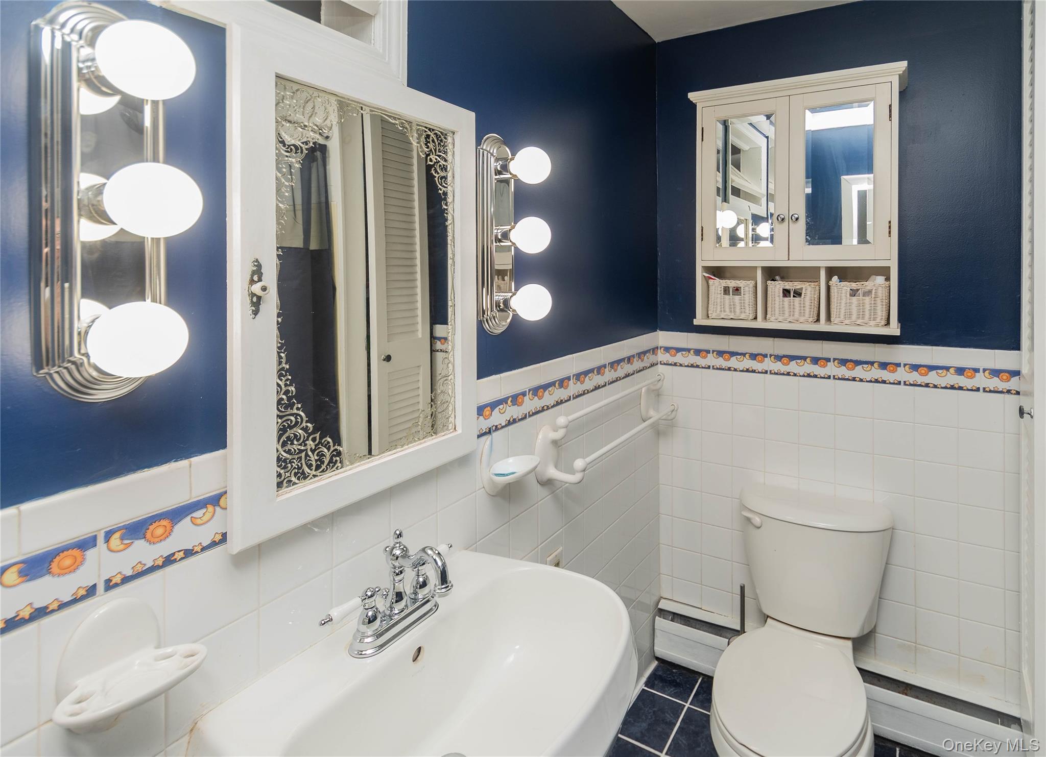 269 Orchard Road Highland, NY 12528 - Photo 18 of 24 a bathroom with a toilet a sink and mirror