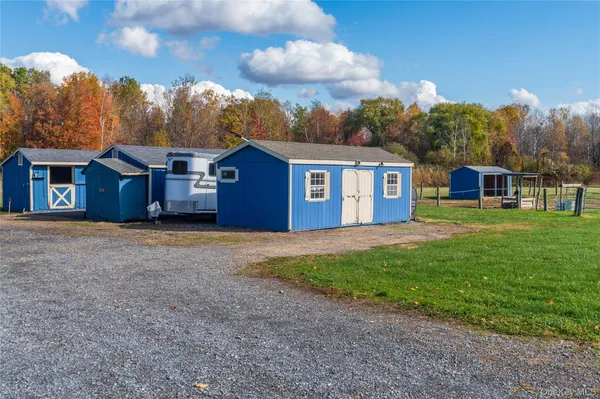front view of a house with a big yard
