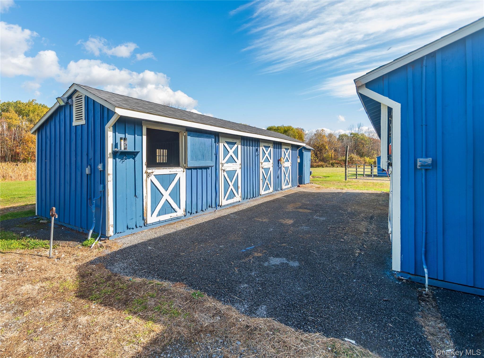 269 Orchard Road Highland, NY 12528 - Photo 21 of 24 a view of backyard with large trees and wooden fence