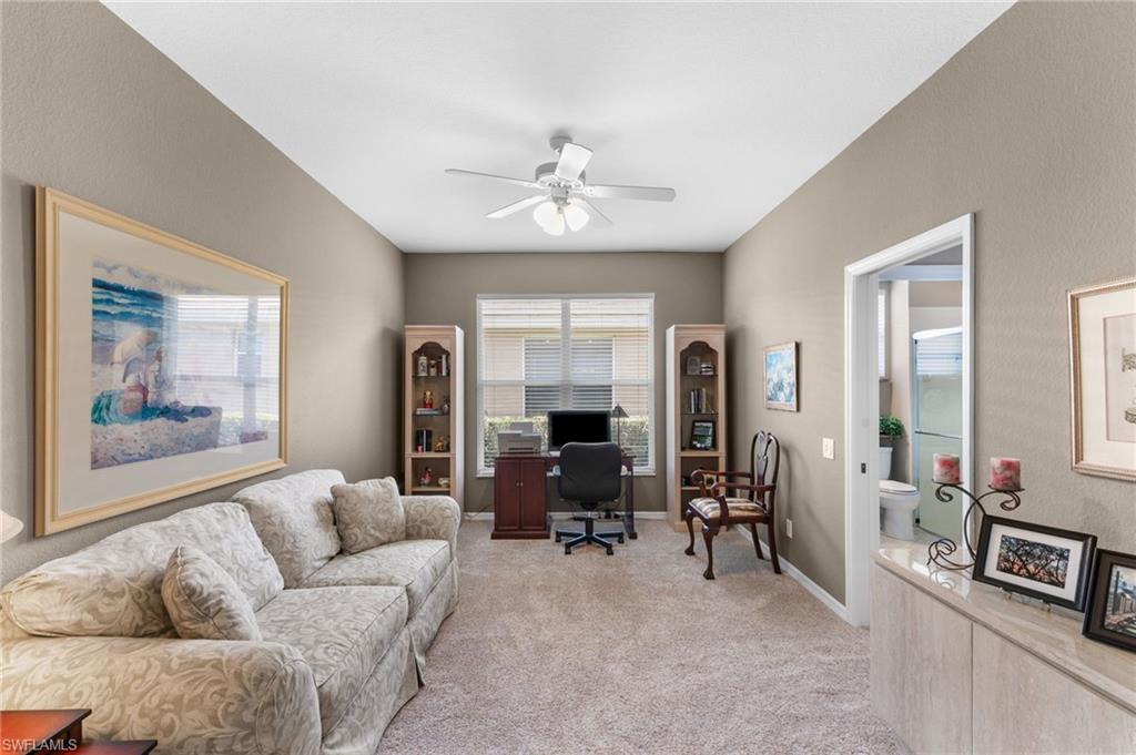 1717 Winding Oaks Way Naples, FL 34109 - Photo 24 of 35 Carpeted office space with ceiling fan