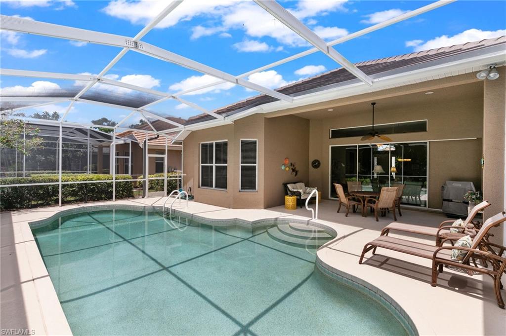 1717 Winding Oaks Way Naples, FL 34109 - Photo 27 of 35 View of pool with a patio, a lanai, and ceiling fan