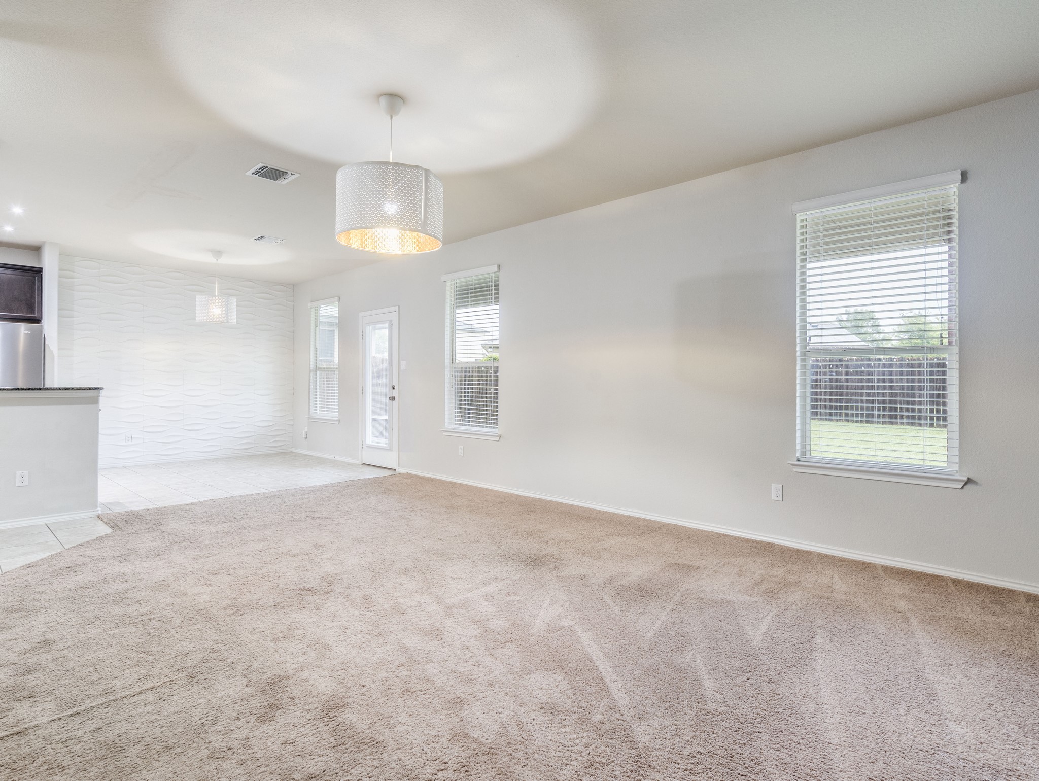 213 Ammonite Lane Jarrell, TX 76537 - Photo 13 of 34 a view of an empty room with a window