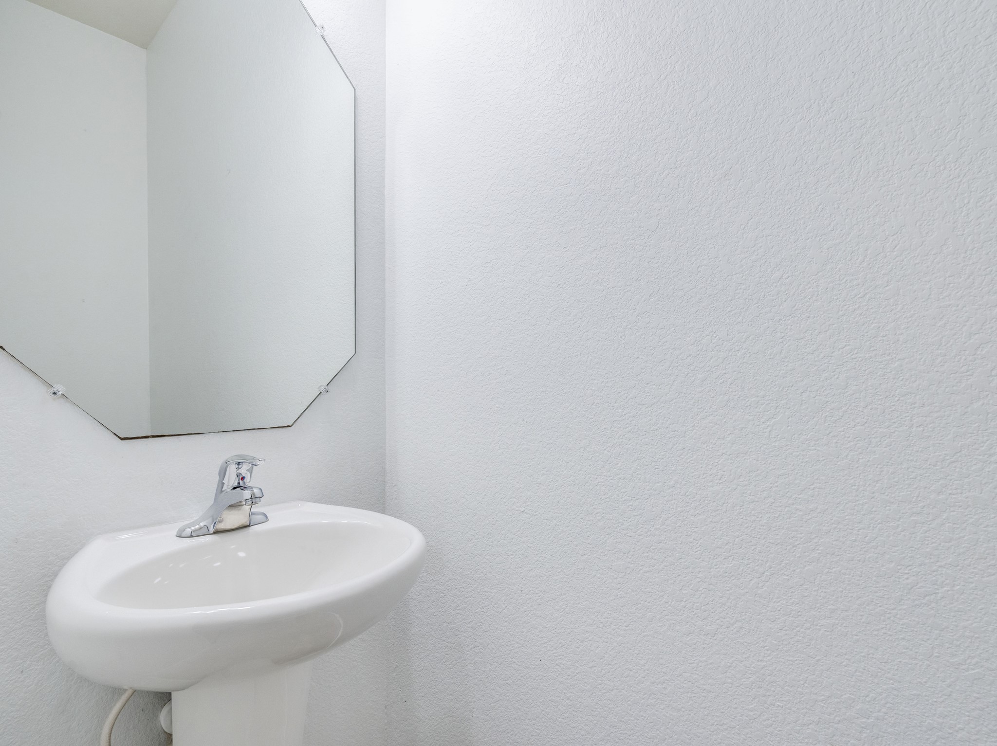 213 Ammonite Lane Jarrell, TX 76537 - Photo 14 of 34 a sink with a mirror