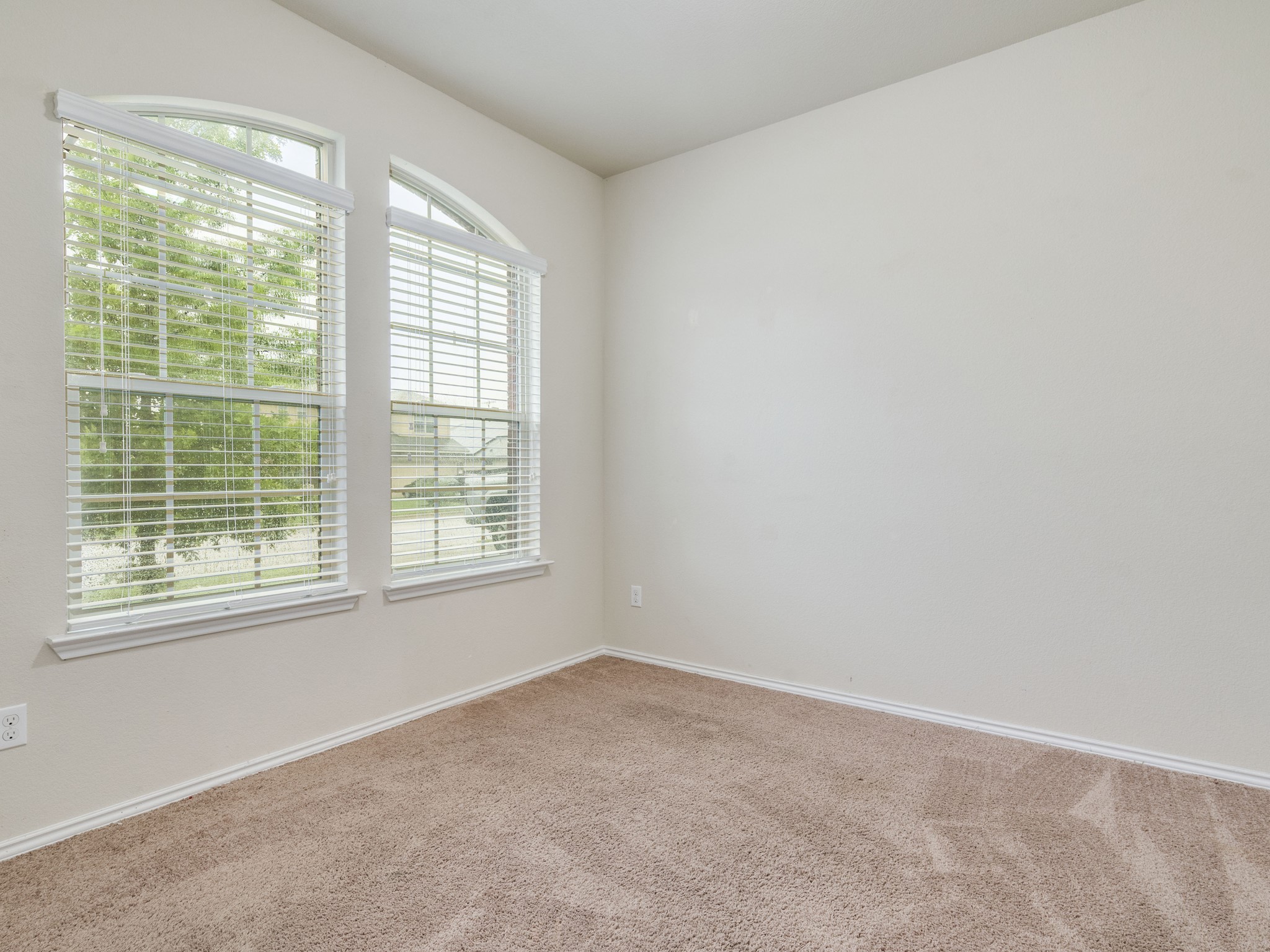 213 Ammonite Lane Jarrell, TX 76537 - Photo 15 of 34 an empty room with a window