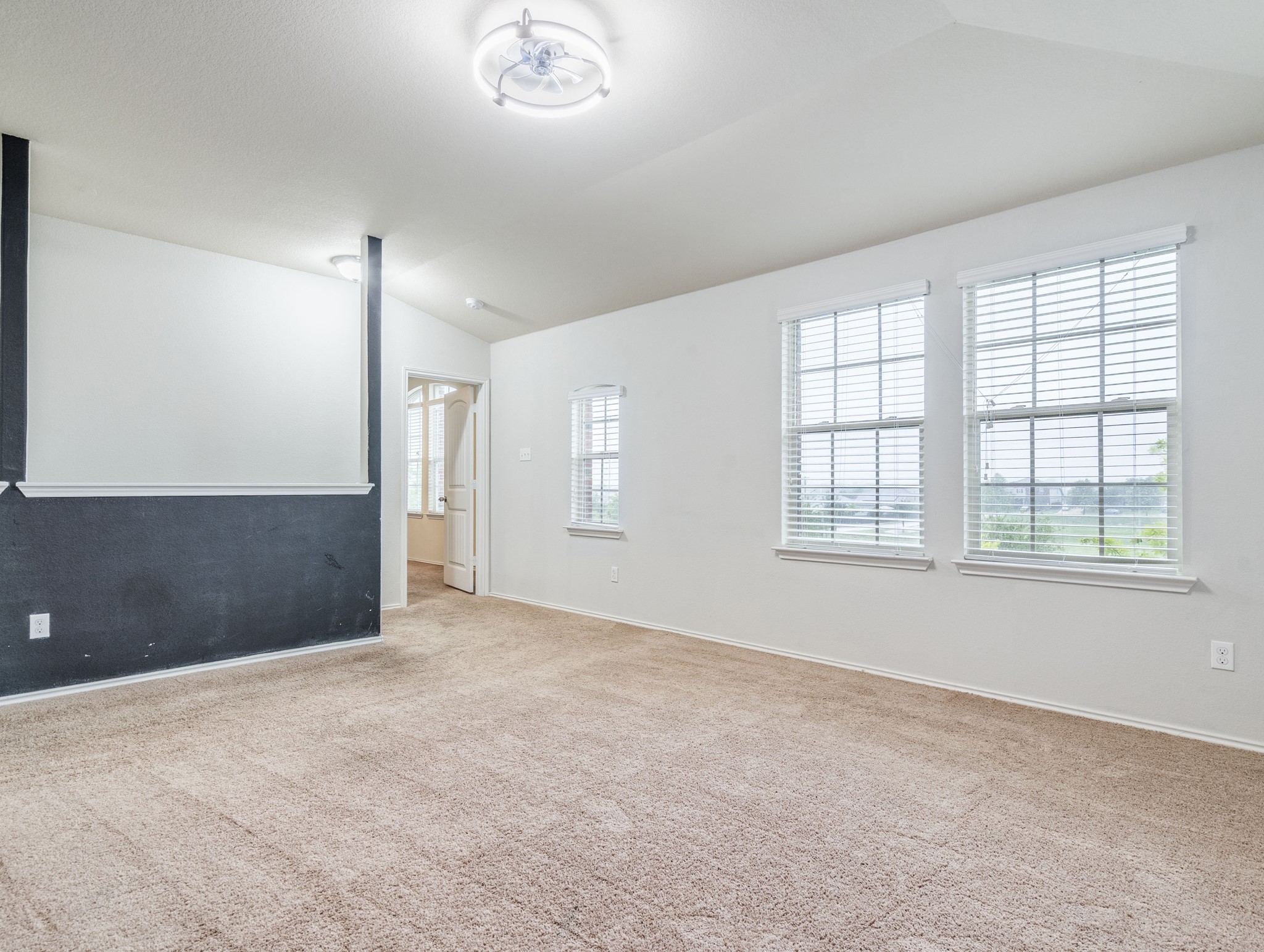 213 Ammonite Lane Jarrell, TX 76537 - Photo 18 of 34 an empty room with windows