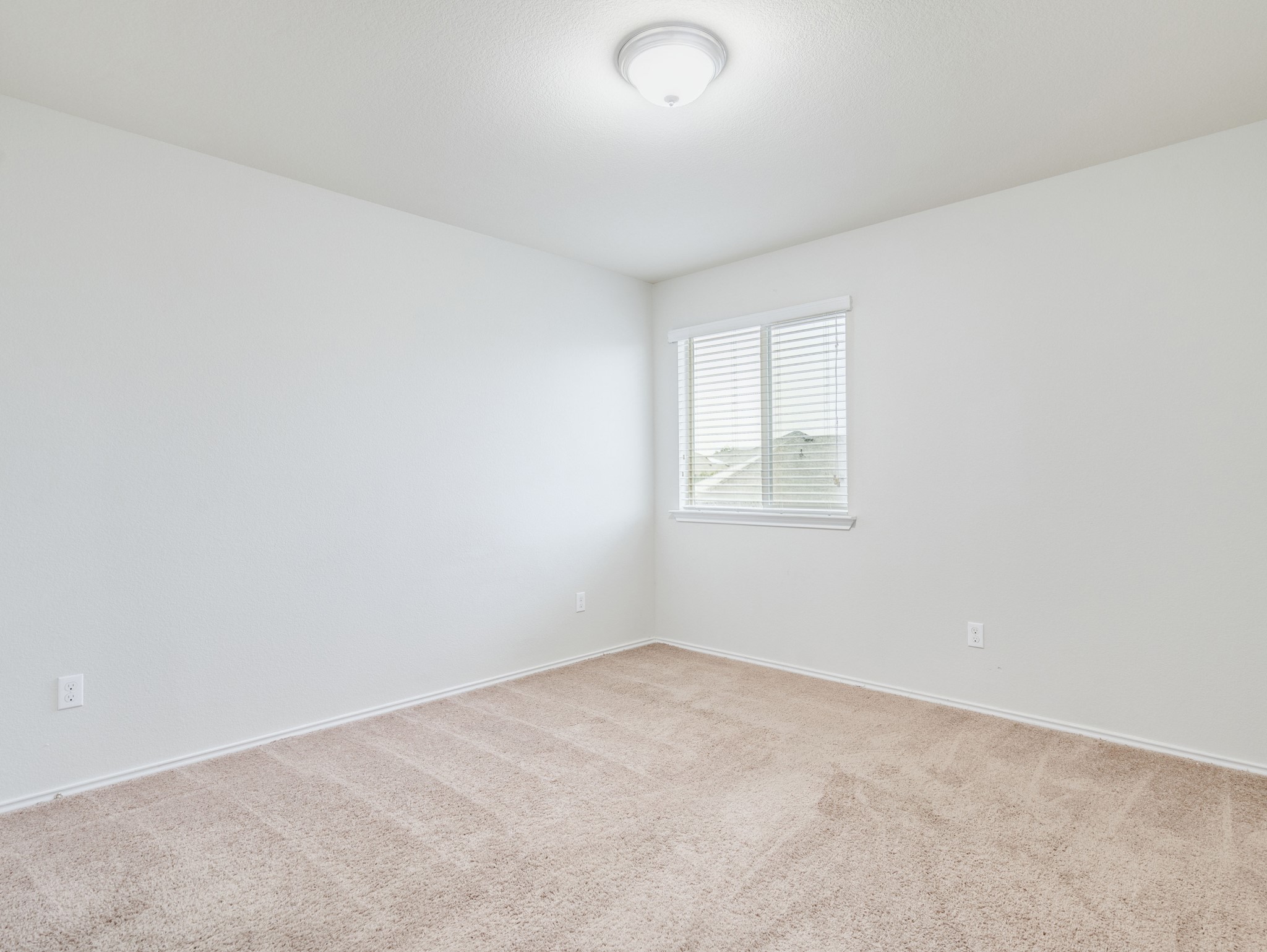 213 Ammonite Lane Jarrell, TX 76537 - Photo 22 of 34 an empty room with a window