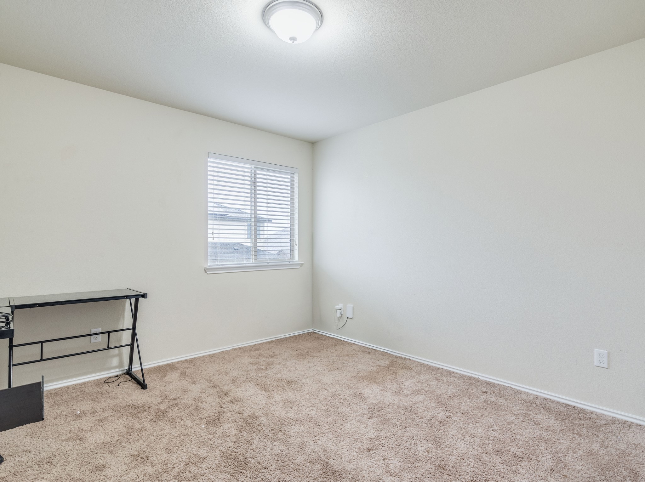 213 Ammonite Lane Jarrell, TX 76537 - Photo 26 of 34 an empty room with windows