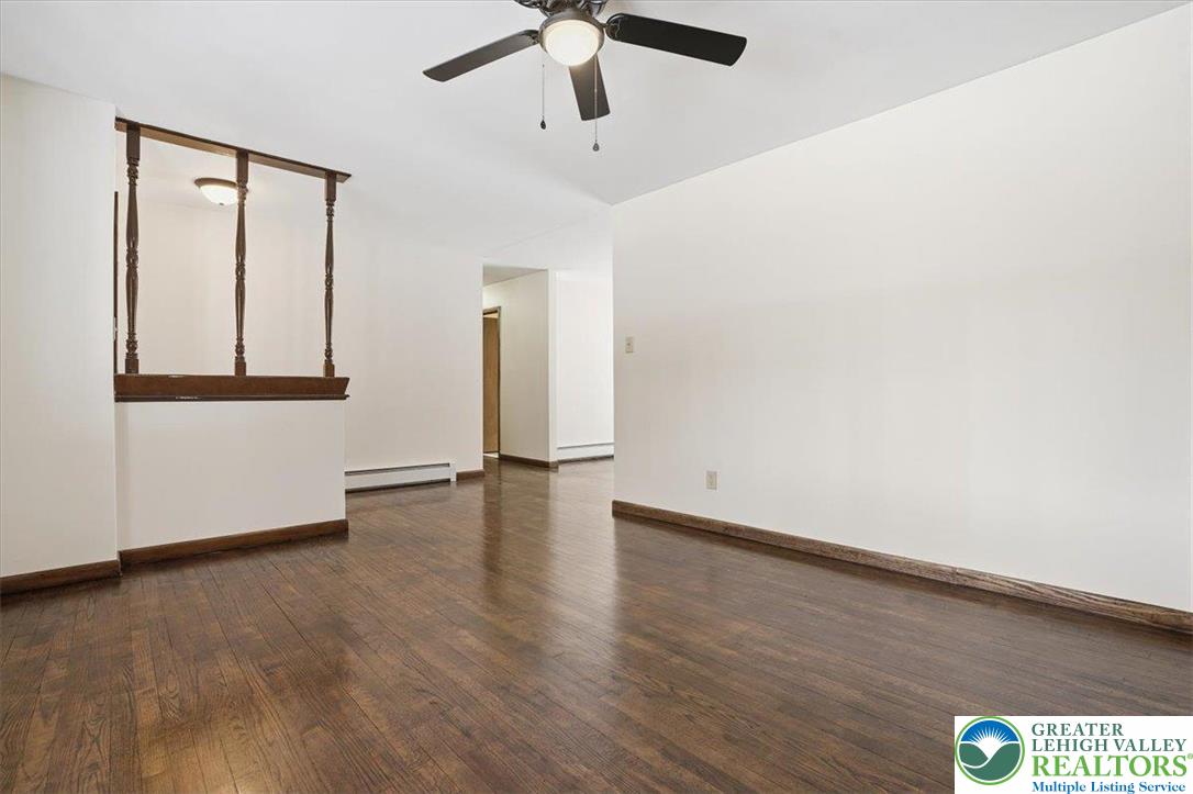401 Highland Hill Road Jim Thorpe, PA 18235 - Photo 15 of 71 a view of an empty room with window and wooden floor