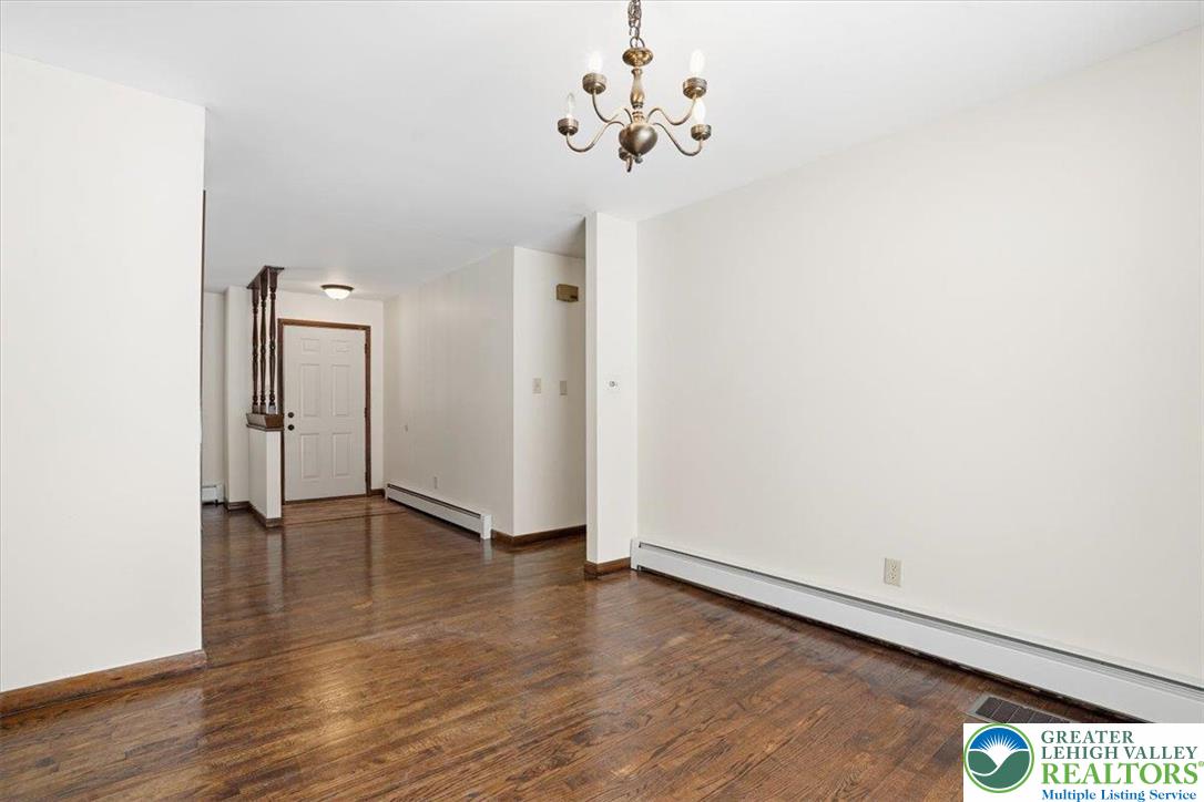 401 Highland Hill Road Jim Thorpe, PA 18235 - Photo 18 of 71 a view of an empty room with wooden floor