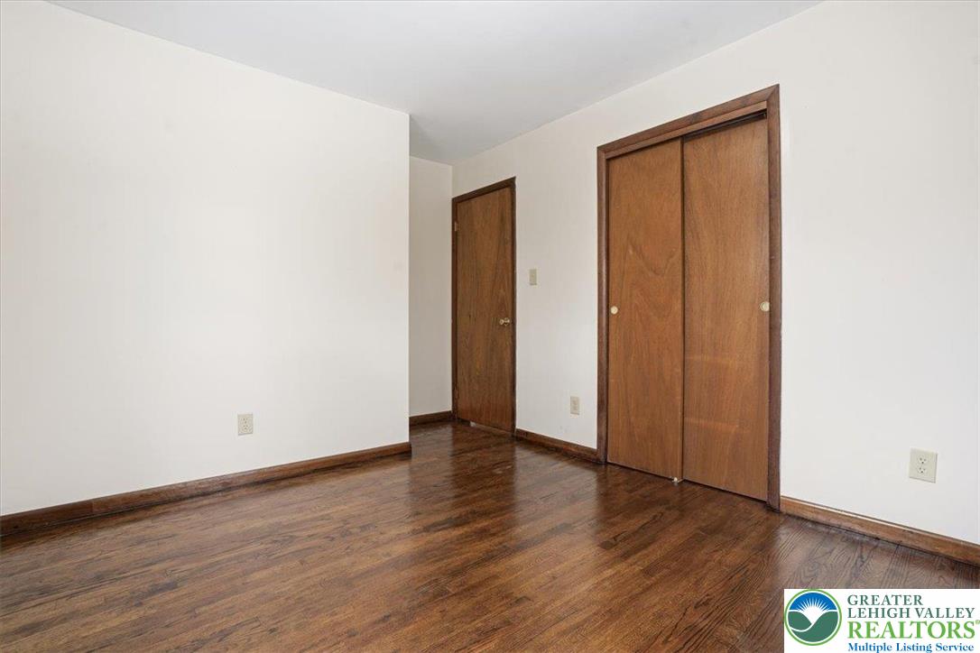 401 Highland Hill Road Jim Thorpe, PA 18235 - Photo 31 of 71 a view of an empty room with wooden floor and closet