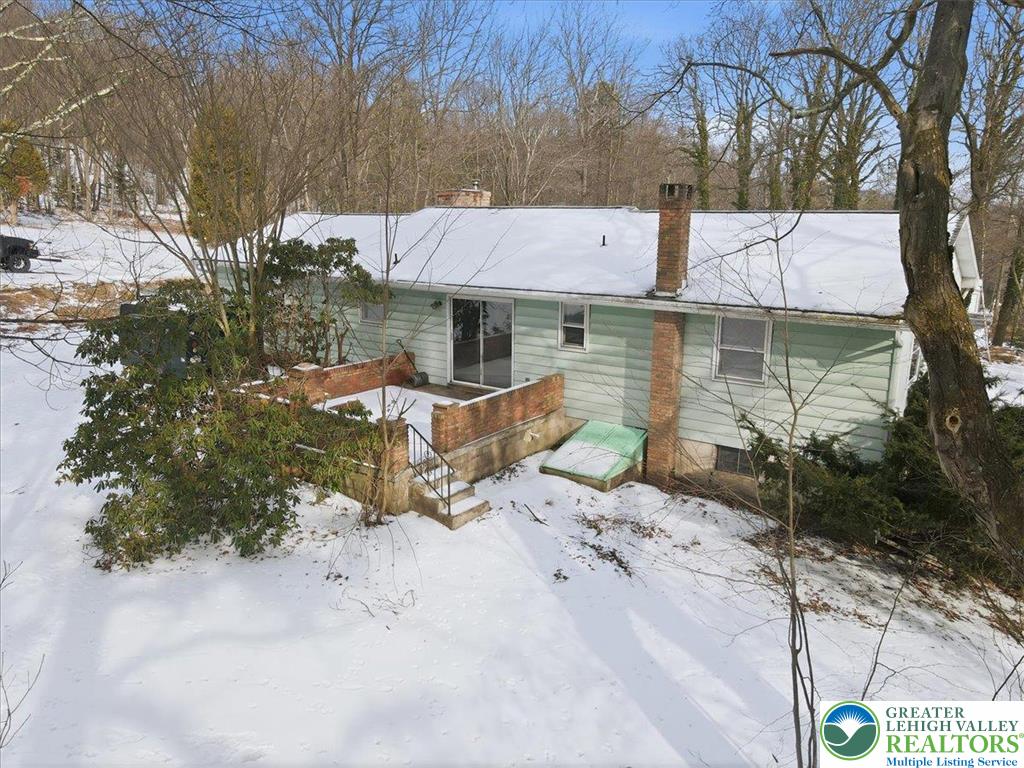401 Highland Hill Road Jim Thorpe, PA 18235 - Photo 57 of 71 a view of a house with backyard and sitting area