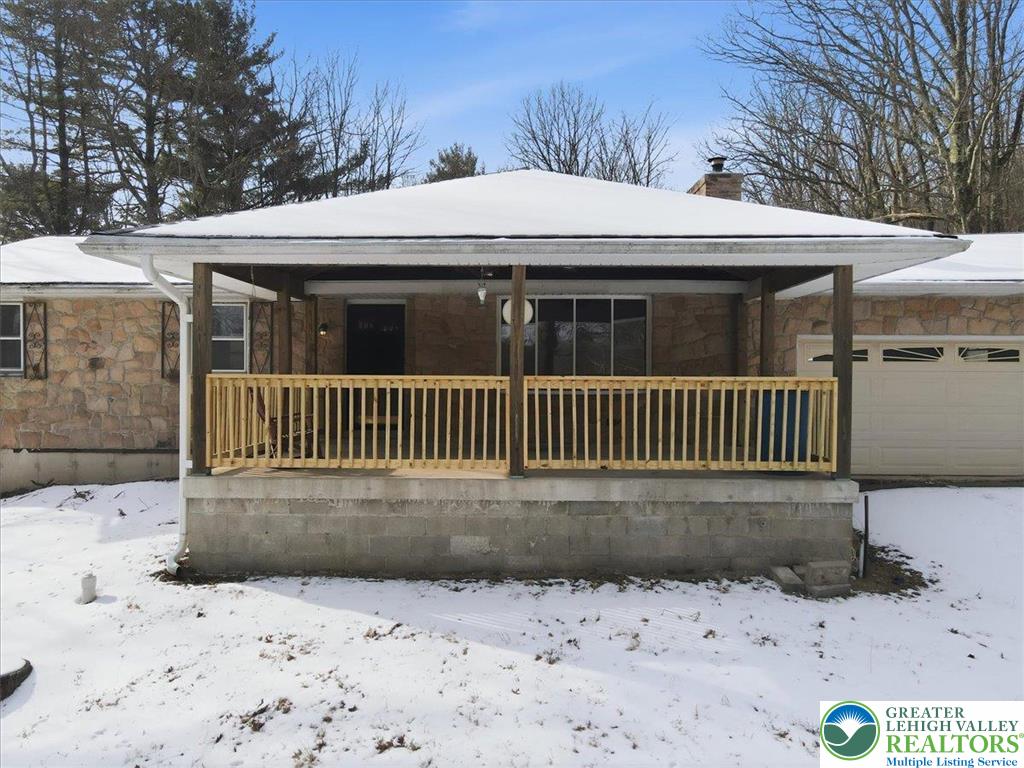 401 Highland Hill Road Jim Thorpe, PA 18235 - Photo 7 of 71 a view of a house with a yard