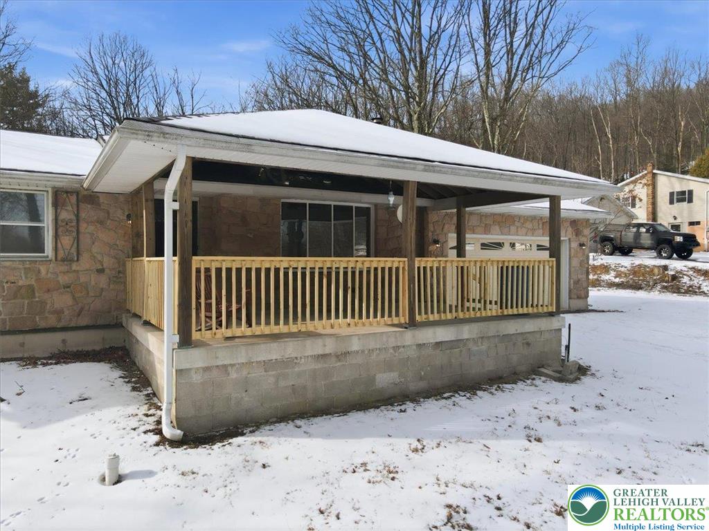 401 Highland Hill Road Jim Thorpe, PA 18235 - Photo 8 of 71 a view of a house with a yard