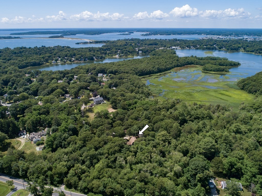 an aerial view of valley and lake
