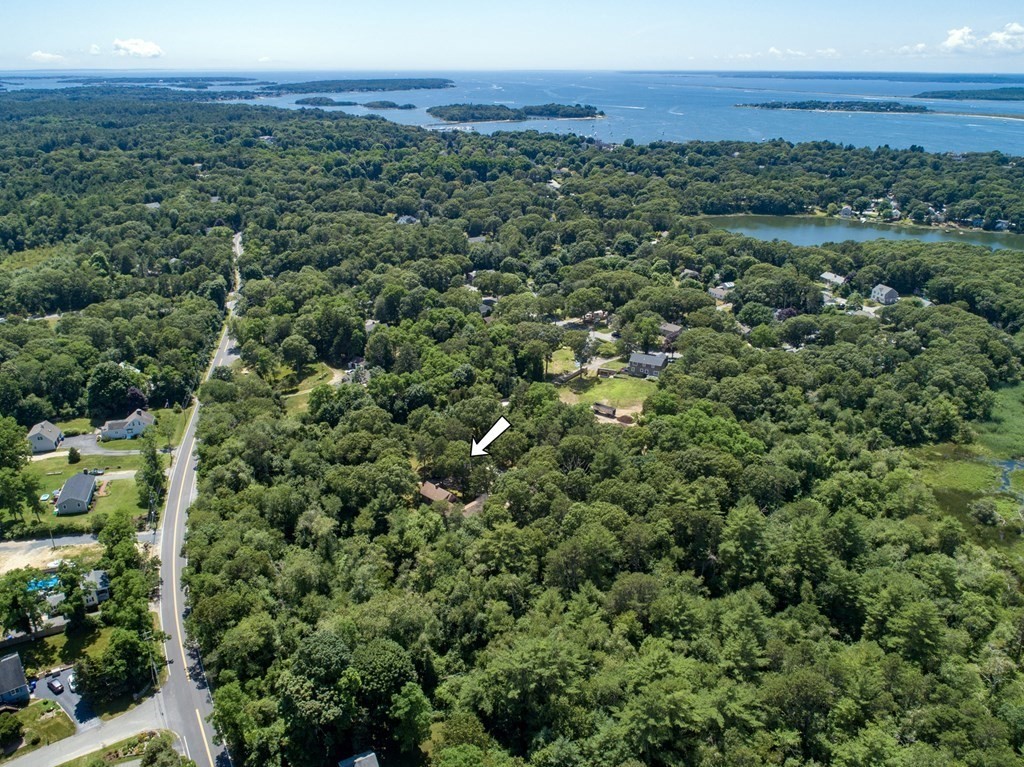 262 County Road Bourne, MA 02532 - Photo 18 of 23 a view of a city with lush green forest