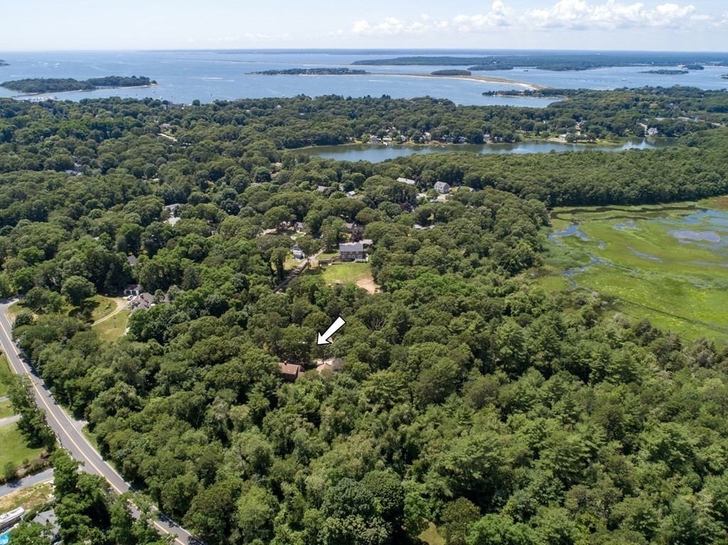 262 County Road Bourne, MA 02532 - Photo 19 of 23 a view of a city with lush green forest
