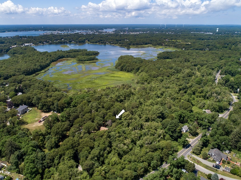 262 County Road Bourne, MA 02532 - Photo 20 of 23 a view of a lake with a city