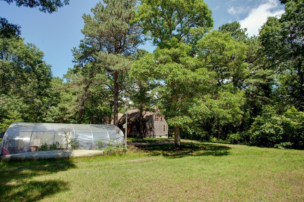 262 County Road Bourne, MA 02532 - Photo 9 of 23 an aerial view of a house with swimming pool and garden